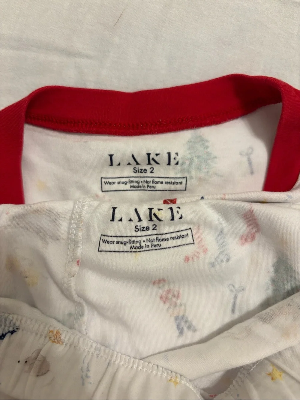 LAKE Kids 2T White Holiday Pajama Set with Red Trim and Festive Print